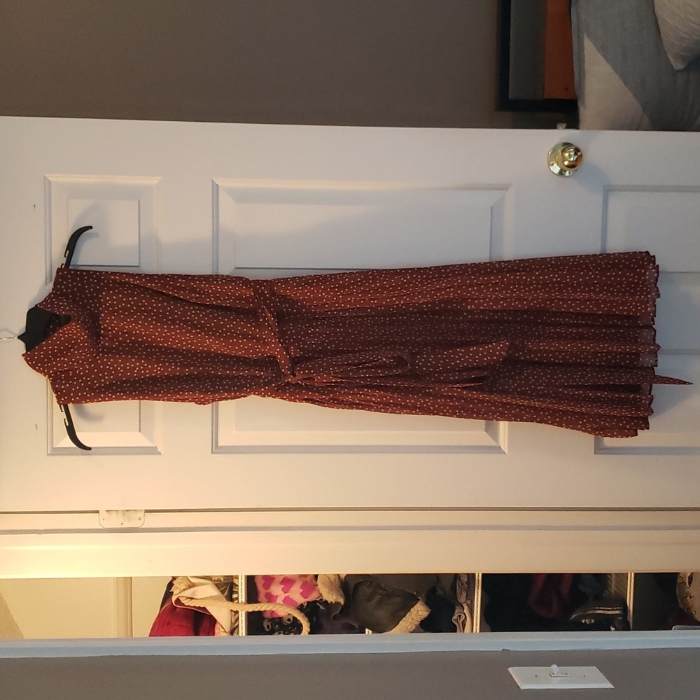 Medium length brown and white polkadot dress. Size 12 Taylor